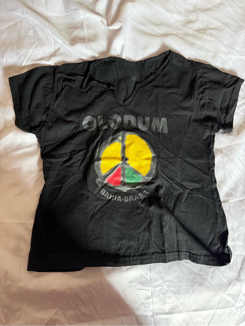 Olodum Black Graphic Tee with Yellow, Red & Green Peace Logo